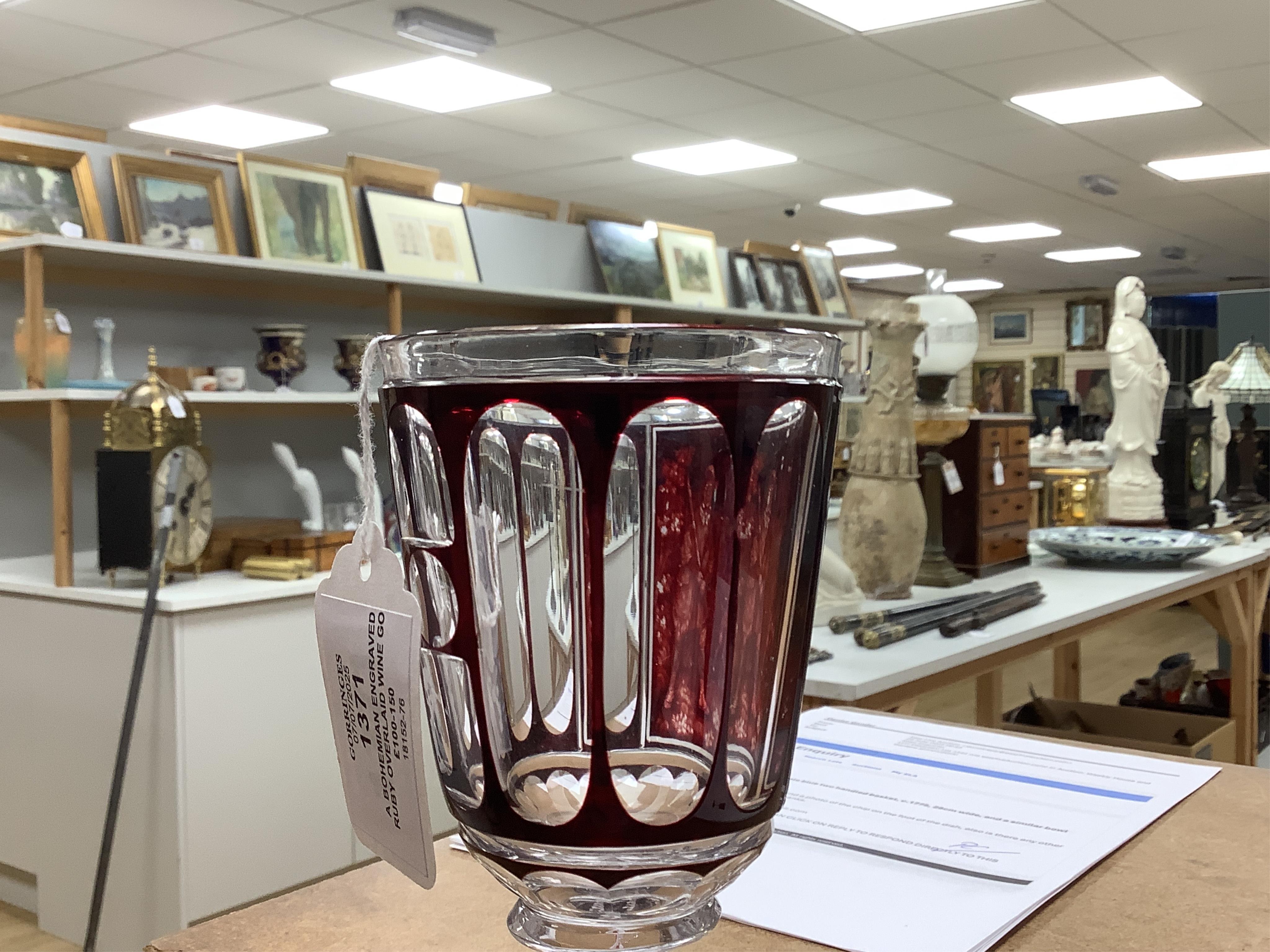 A Bohemian engraved ruby overlaid wine goblet, c.1850